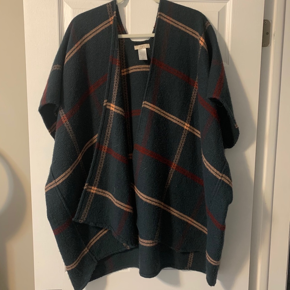 Poncho. No rips stains or holes.